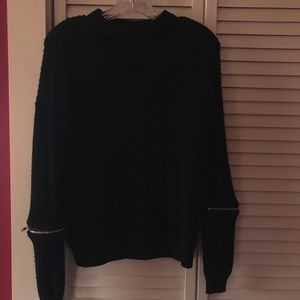 black cutout sweater with zipper sleeve detail